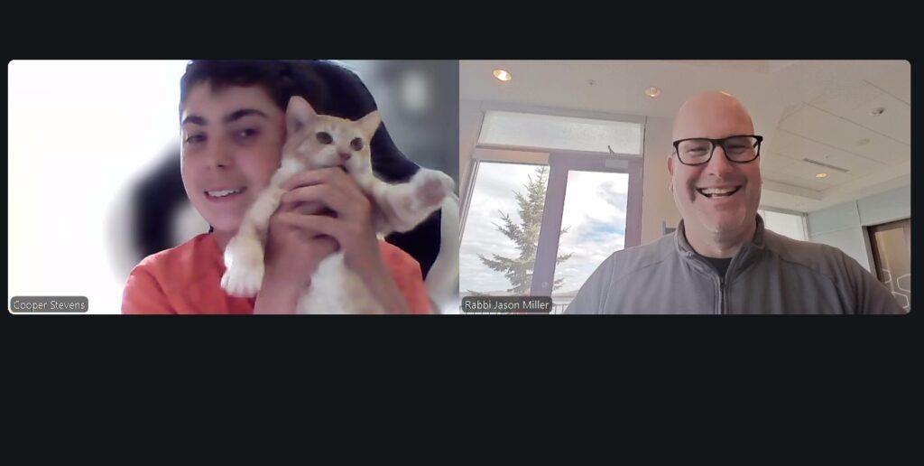 Bar Mitzvah Student and Cat on Zoom